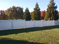 <b>A 60 inch Semi-Private white vinyl picket fence</b>